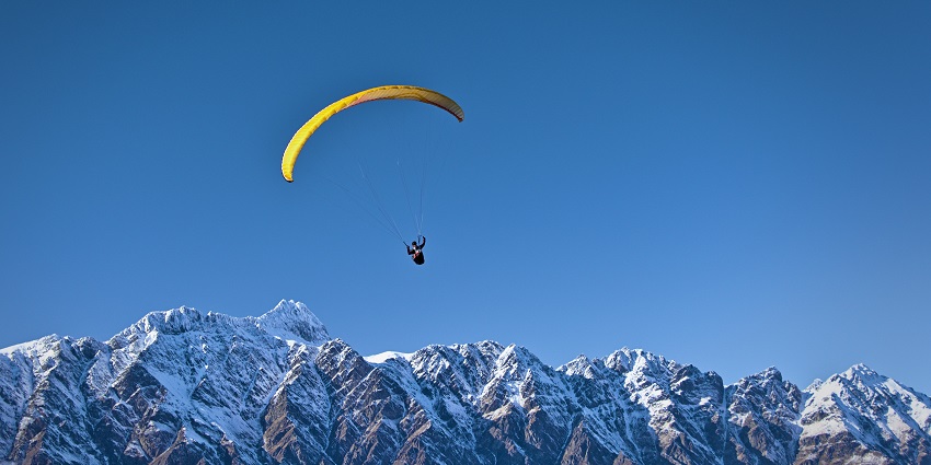 One of the popular Solang Valley activities in April includes paragliding