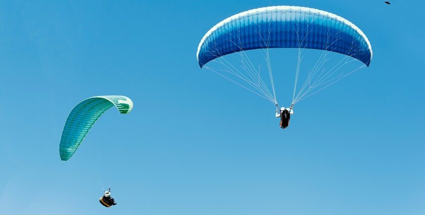 A view of people soaring high up in the air as they indulge in this thrilling activity.