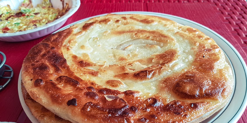 Visiting and enjoying paratha is one of the best things to do in Chandni Chowk Delhi.