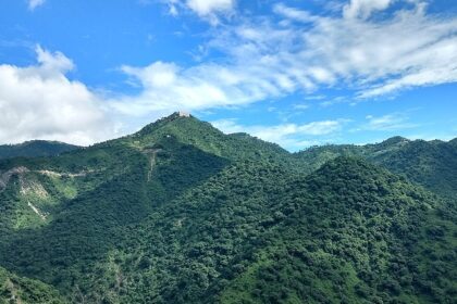 The view of mountains covered in lush greenery in Parwanoo, Himachal Pradesh, India.