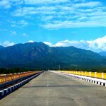 View of Pasighat bridge, backdrop lush green mountains - places to visit in Pasighat