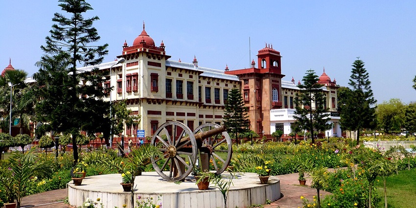 A view of Patna Museum's grand architecture with outdoor display and high ceilings