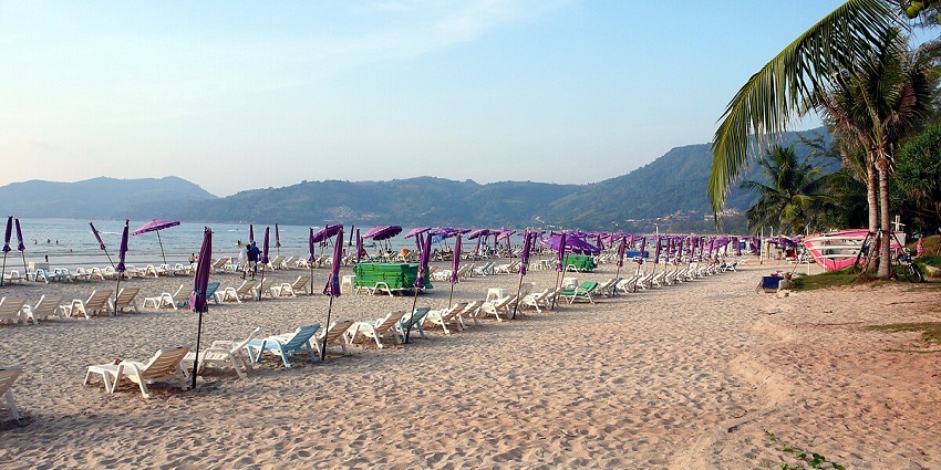 Patong Beach surrounded by lush hills is one of the tourist places in Phuket