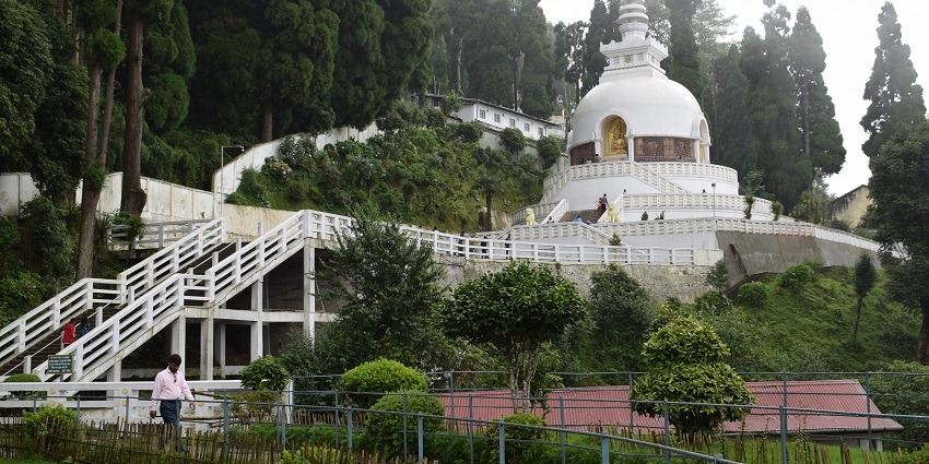 The beautiful view of Peace Pagoda against a clear sky in Darjeeling, West Bengal.