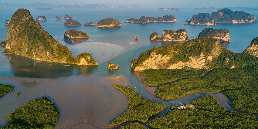 Aerial view of Phang Nga Bay's limestone karsts and mangrove forests, Thailand