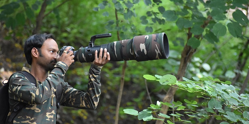 A wildlife photographer clicking pictures at Khangchendzonga National Park