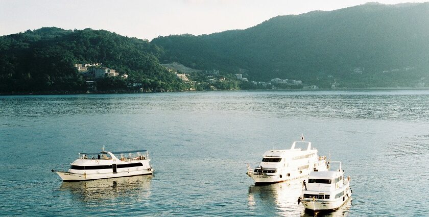 A view of ships cruising the waters offering picturesque views of the surroundings.