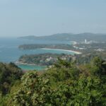 An aerial view of the beautiful island and beaches of Phuket showing greenery and seashores