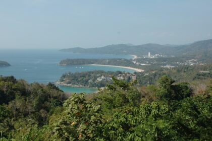 An aerial view of the beautiful island and beaches of Phuket showing greenery and seashores