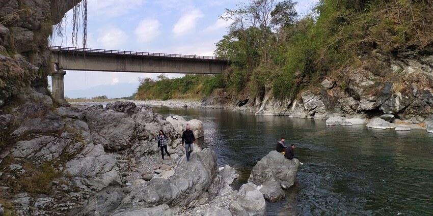 Scenic Kamlang picnic spot, surrounded by lush greenery, in Arunachal Pradesh.