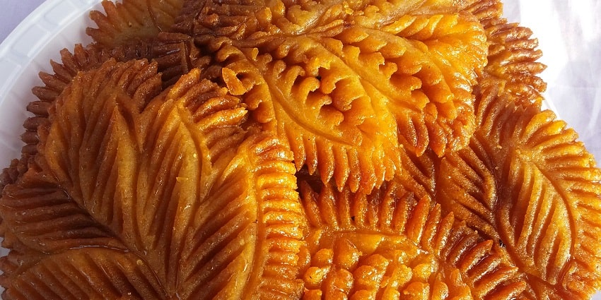 Pittha, made with rice flour and lentils, is nonetheless, a must-try best food in Ranchi.