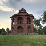 Beautiful panoramic snap of the Purana Quila taken in the evening surrounded by lush trees