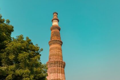 A glimpse of the towering Qutub Minar, a popular tourist attraction of the region.