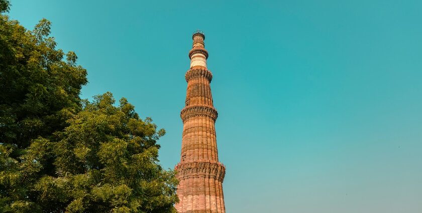 A glimpse of the towering Qutub Minar, a popular tourist attraction of the region.