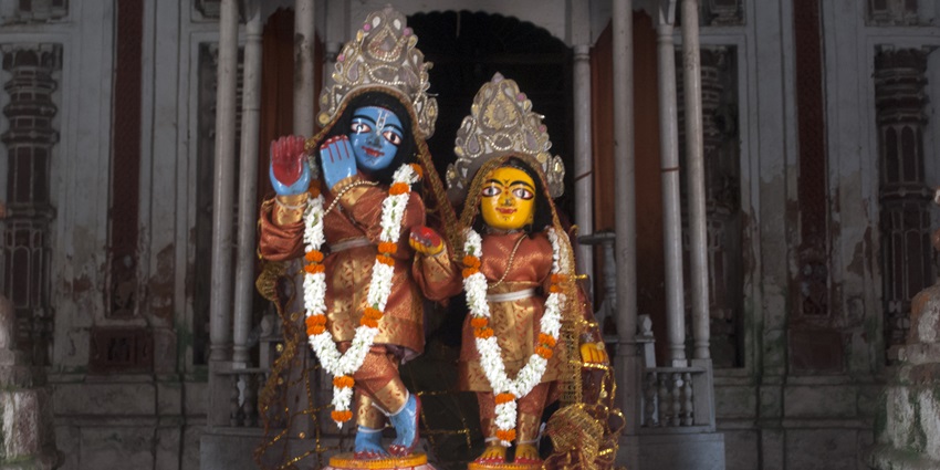 Idols of deities Radha and Krishna in a temple