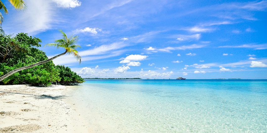 A glimpse of the azure waters and golden sands of Railay Beach in this tropical gem.