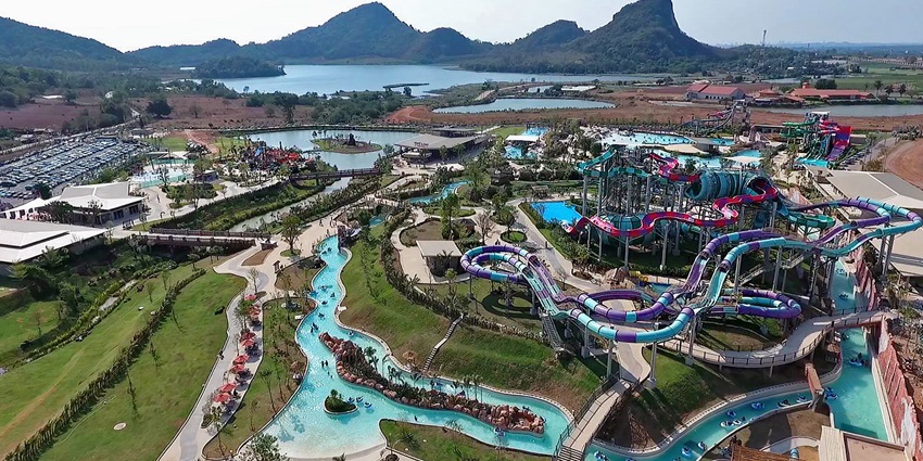 Various water slides, wave pools, and a tropical landscape - water park in Thailand
