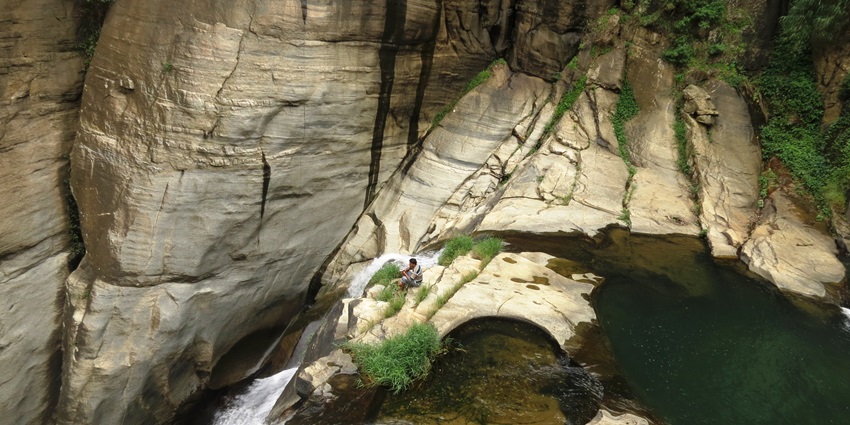 Waterfall pools above Ravana Ella, an adventure spot among places to visit in Sri Lanka.