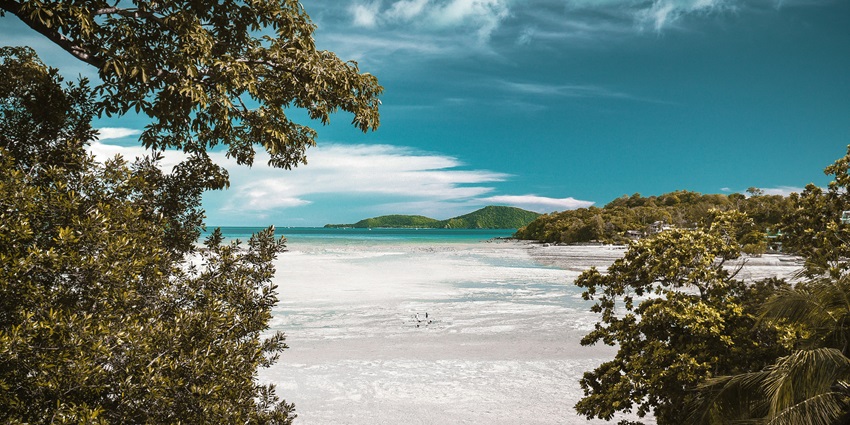 A captivating view of the famous Rawai beach in Phuket with backdrop of cloudy skies
