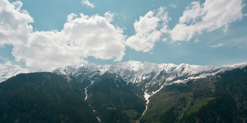 Image of snow-covered mountains in the Kalpa, Reckong Peo, a place to visit in Kinnar.