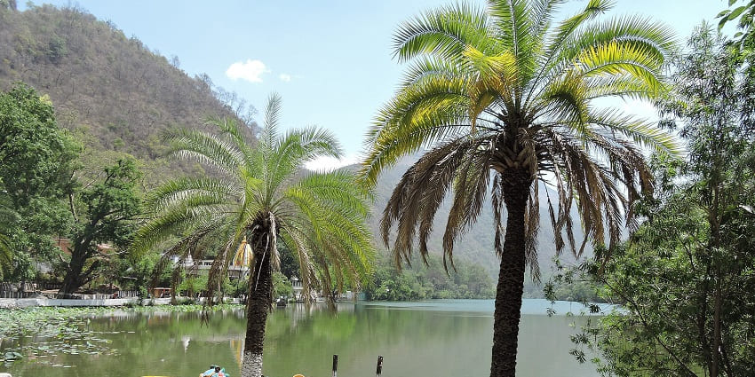 Image of Renuka Lake and boats for travellers to ride and explore around