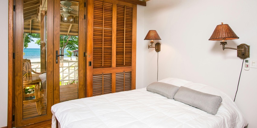 Luxurious Niathu Resort surrounded by lush gardens and tranquil outdoor settings.
