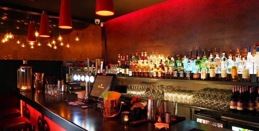 A picture of a bar counter with drinks