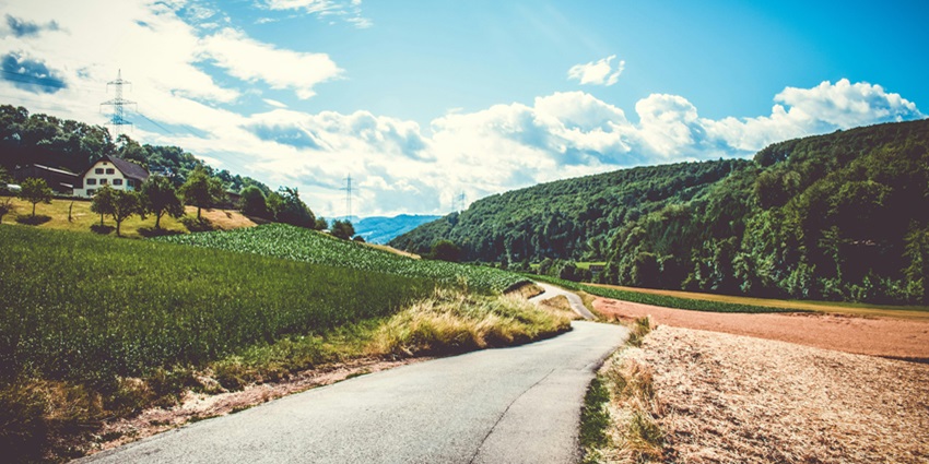 An Idyllic image of a road passing through the beautiful hills of Mouling national park