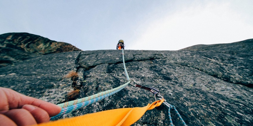 Rock climbing, one of the best adventure sports in Himachal Pradesh, renders a thrilling challenge.