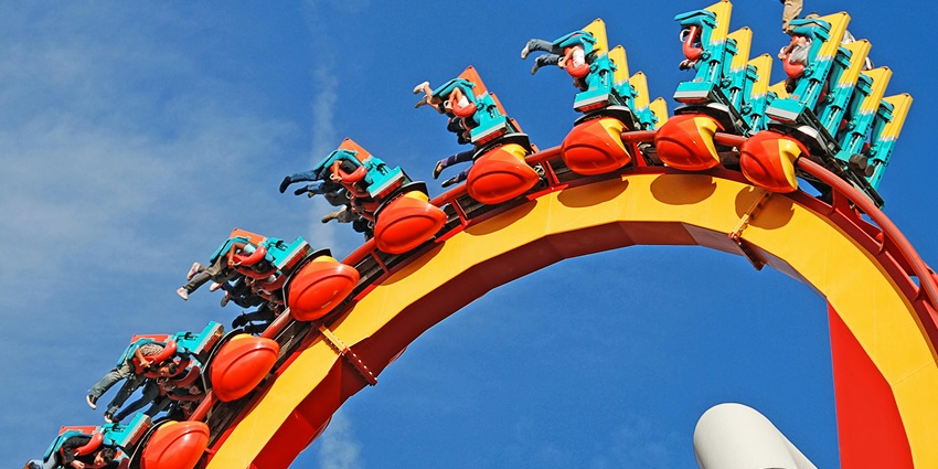 Image of people riding roller coasters in Dream World - places to visit in Bangkok.
