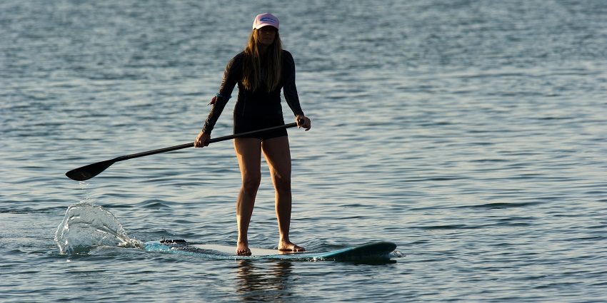 Stand-up paddle boarding is a water activity that is gaining popularity over time.
