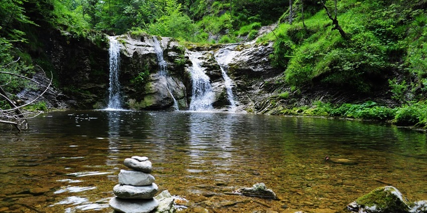 Sadu Chiru Waterfalls offer a refreshing retreat for families and couples alike.