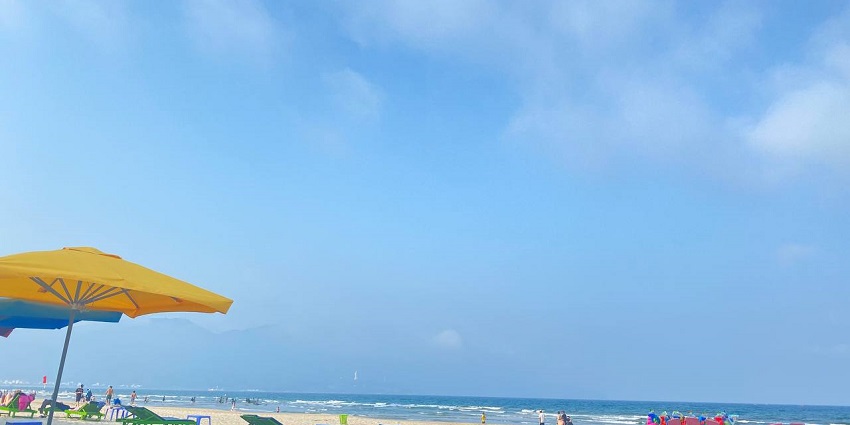 Song Beach in Nha Trang with clear waters and a serene landscape.