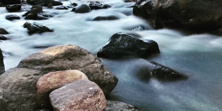 Long exposure shot of a canal near Katiki Waterfalls, a serene spot in Araku Valley.