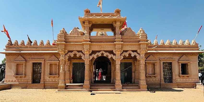 A frontal picture of a temple in south Delhi with traditional architecture and intricate designs