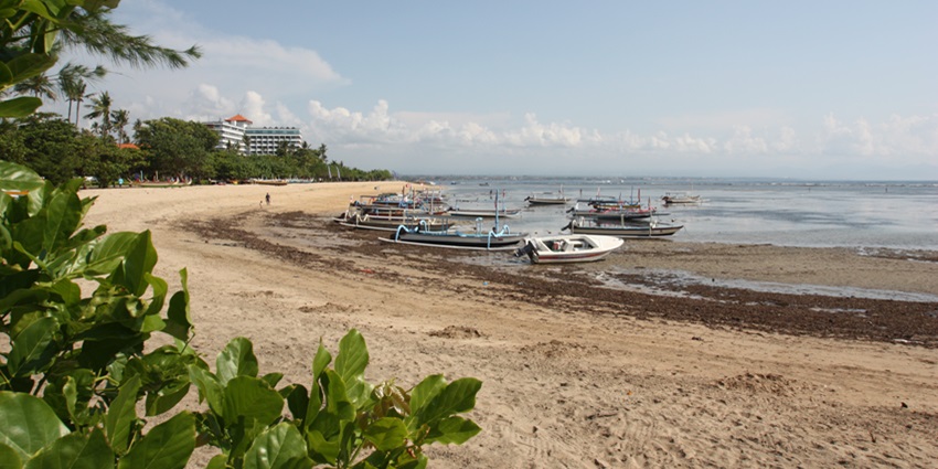 Sanur is one of the popular beaches in Bali with calm extensive shores and golden sands