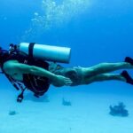 A scuba diver clicked enjoying underwater