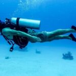 A scuba diving experience in clear waters