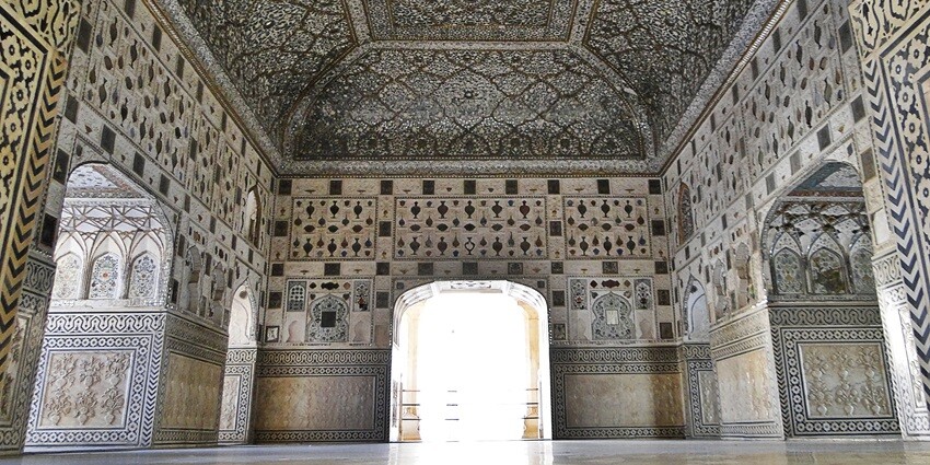 The mirror work and extensive carved walls and ceilings of Sheesh Mahal are a sight to behold