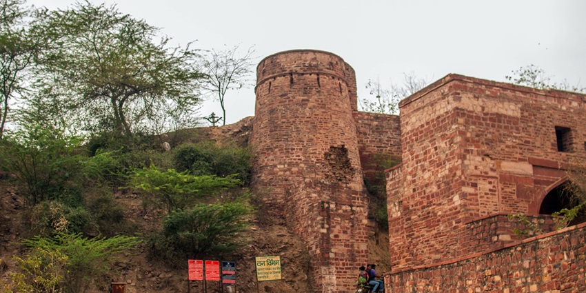 Shergarh Fort ruins atop rugged Chambal valley ravines under open sky