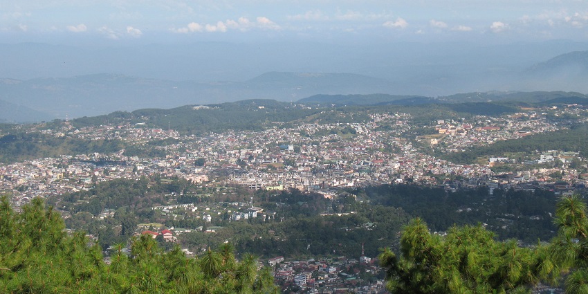 Picturesque view of shillong from top of the hill, lush green and beautiful houses design.