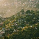 A picture of the Shimla Hill station taken from another mountain at a distance