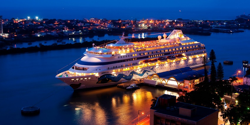 Image of Cruise at night, offering stunning views and a luxurious dining experience.
