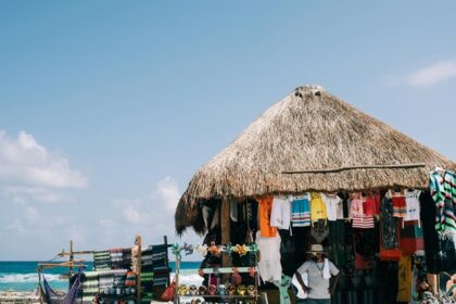 A mesmerising view of a shop with different colourful clothes and accessories displayed.