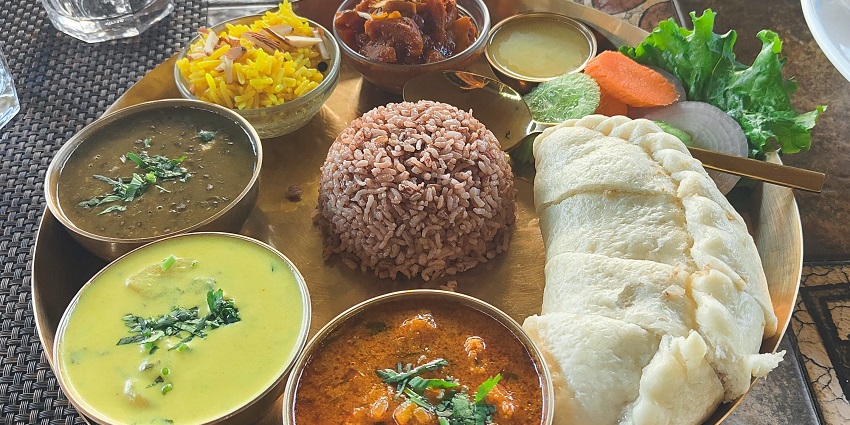 Try traditional food including siddhu and red rice while you visit Kamru Fort.