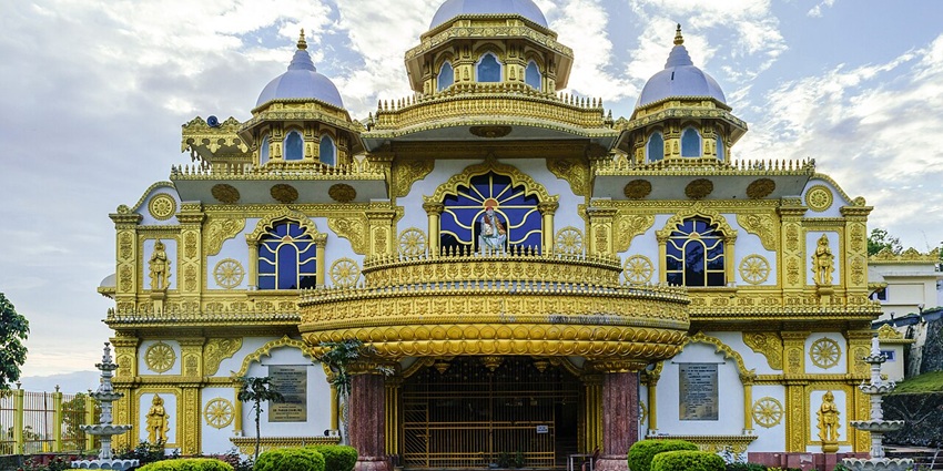 Golden Temple in Namchi with landscaped garden and Himalayan view.