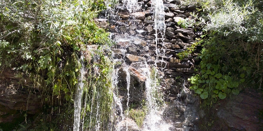 Sissu Waterfall falls into an intervening pool below its waters, creating a hypnotic sight.