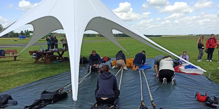 Skydivers preparing at the diving spot for their enthralling adventurous jump
