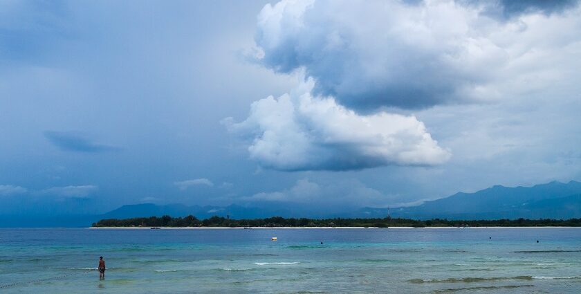 A picture taken from the Gili Islands showing the vast sea and huge clouds