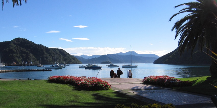 Scenic Southern Islands Tour showcasing lush landscapes and serene blue waters.